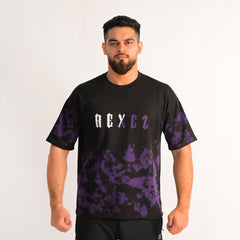 Man wearing a black t-shirt with purple camouflage patterns and 'REX EZ' text on a white background